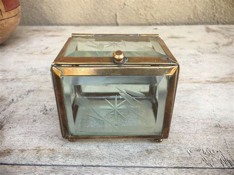 small glass box with lid